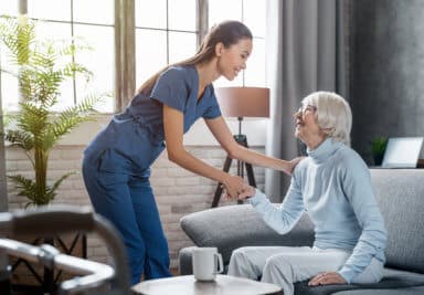 caregiver assisting the elderly